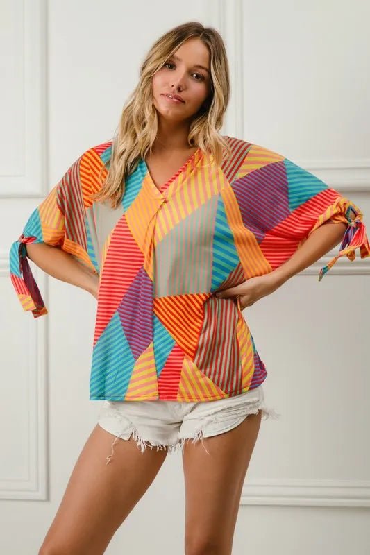 Crowned Energy CO. RED/YELLOW/GRN / S Trendsi Tops/Blouses & Shirts BiBi Multi Stripe Block Printed Jersey Blouse with Tied Sleeves
