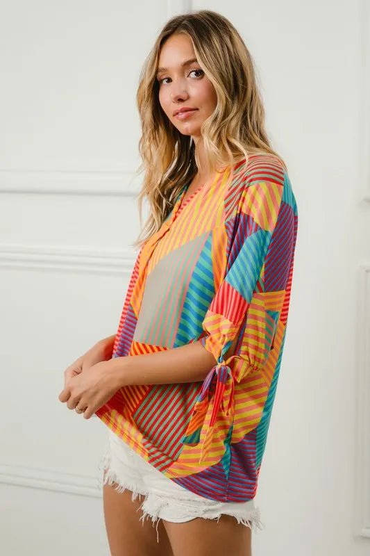 Crowned Energy CO. RED/YELLOW/GRN / S Trendsi Tops/Blouses & Shirts BiBi Multi Stripe Block Printed Jersey Blouse with Tied Sleeves