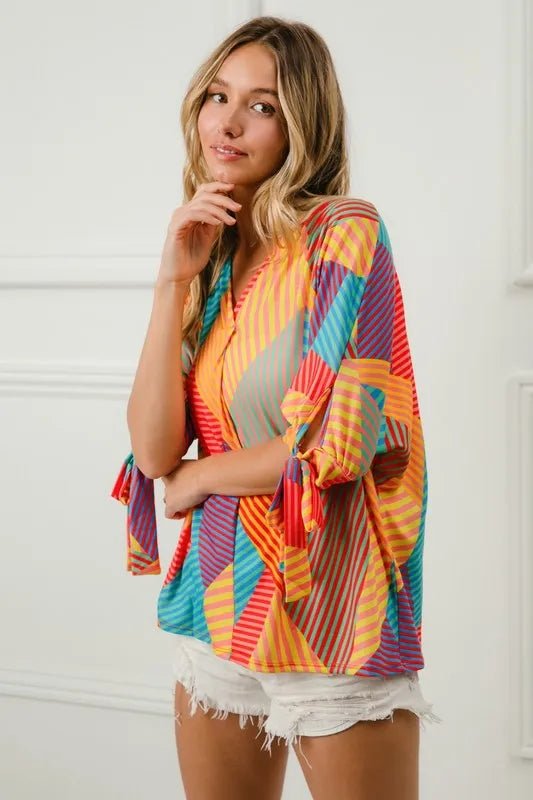Crowned Energy CO. RED/YELLOW/GRN / S Trendsi Tops/Blouses & Shirts BiBi Multi Stripe Block Printed Jersey Blouse with Tied Sleeves