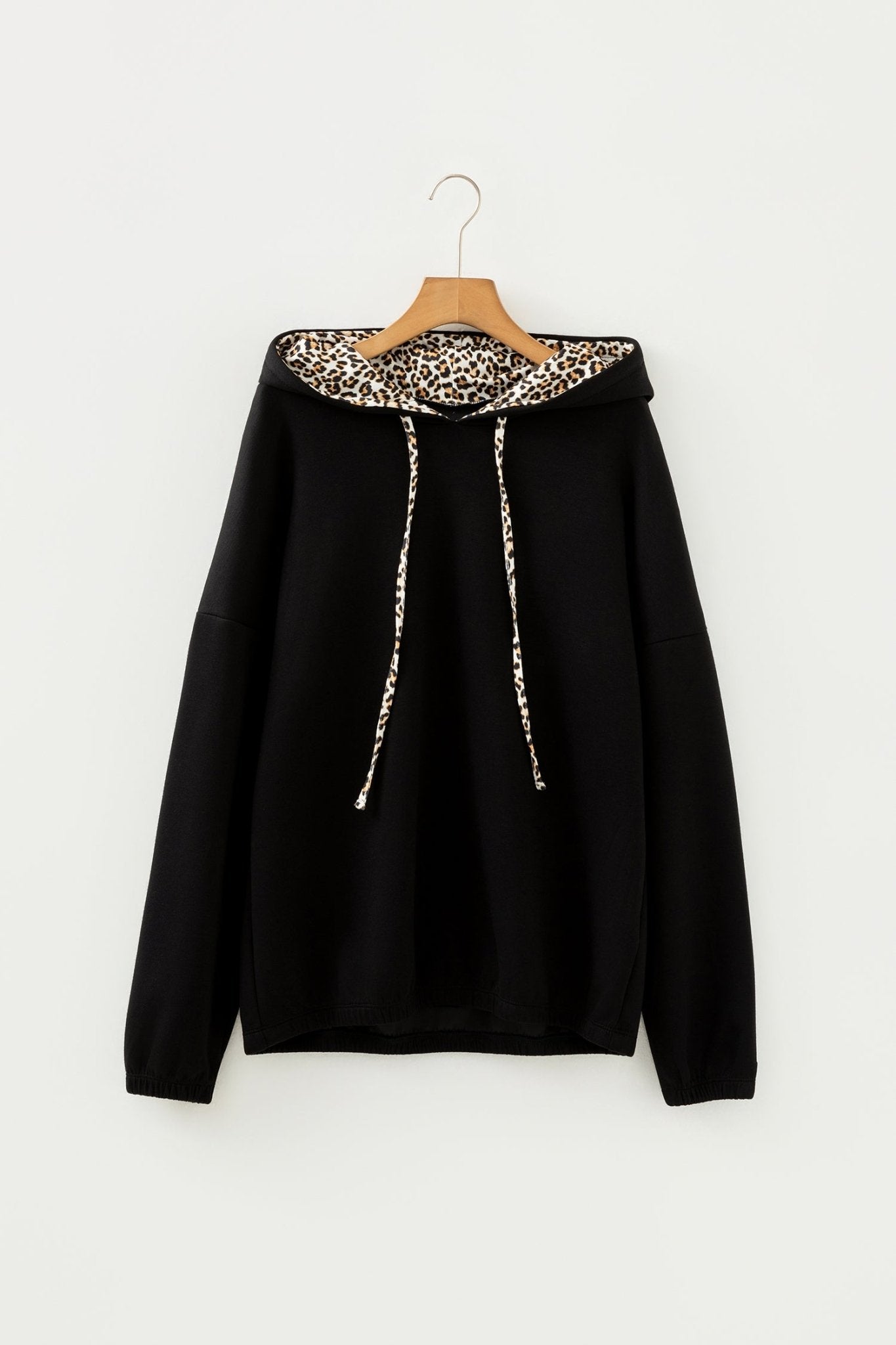 Black Leopard Contrast Drawstring Hood Drop Shoulder Loose Top - Crowned Energy CO.