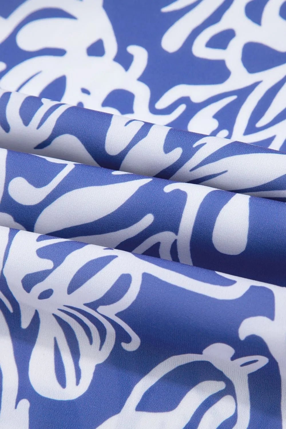 Crowned Energy CO. Dusty Blue / S Trendsi Dresses Floral Print Spaghetti Strap High Waist Dress