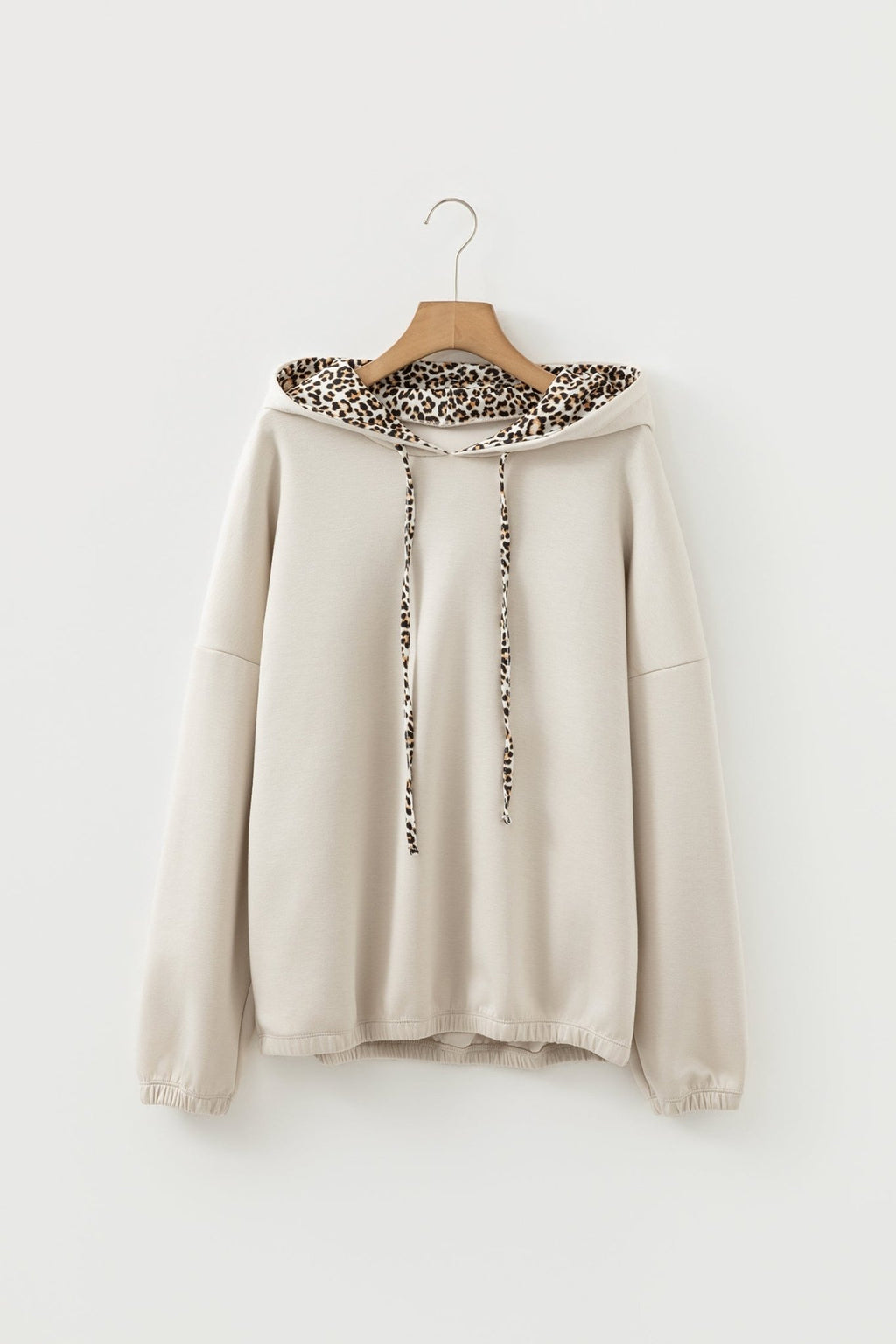 Jet Stream Leopard Contrast Drawstring Hood Drop Shoulder Loose Top - Crowned Energy CO.